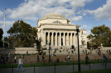 Students walk across the campus of Columbia University in New York
