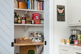 white kitchen with gray pantry doors