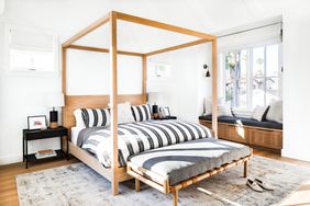 bed with full wooden frame