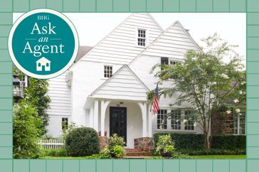 white home exterior with American flag