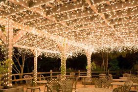 Outdoor string lights we recommend strung over an outdoor patio cover