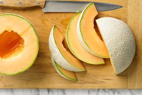 slicing cantaloupe