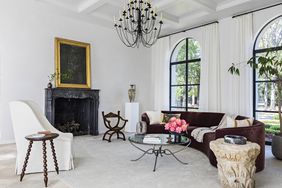 black marble fireplace in bold living room