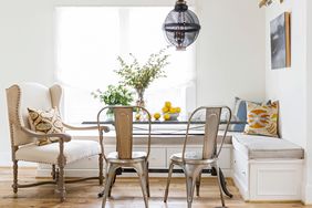 well-lit dining nook with built-in bench seating