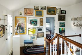 gallery wall stair landing 