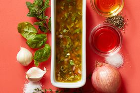 ingredients for Gluten-Free Fresh Herb Vinaigrette on red background