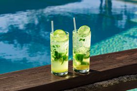 two mojitos by pool