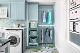 laundry room with rods for drying clothes