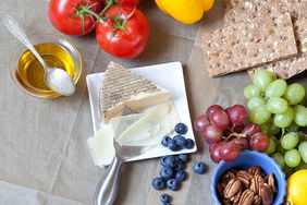 Mediterranean foods on a beige surface