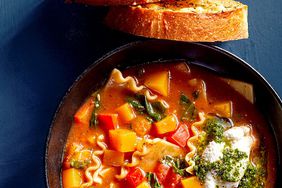 bowl of Veggie-Pesto Lasagna Soup with bread