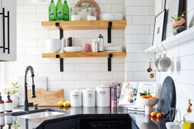 small black and white kitchen with open shelves