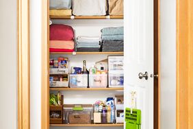 toiletry and towel storage in closet