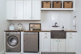 Basement white laundry room